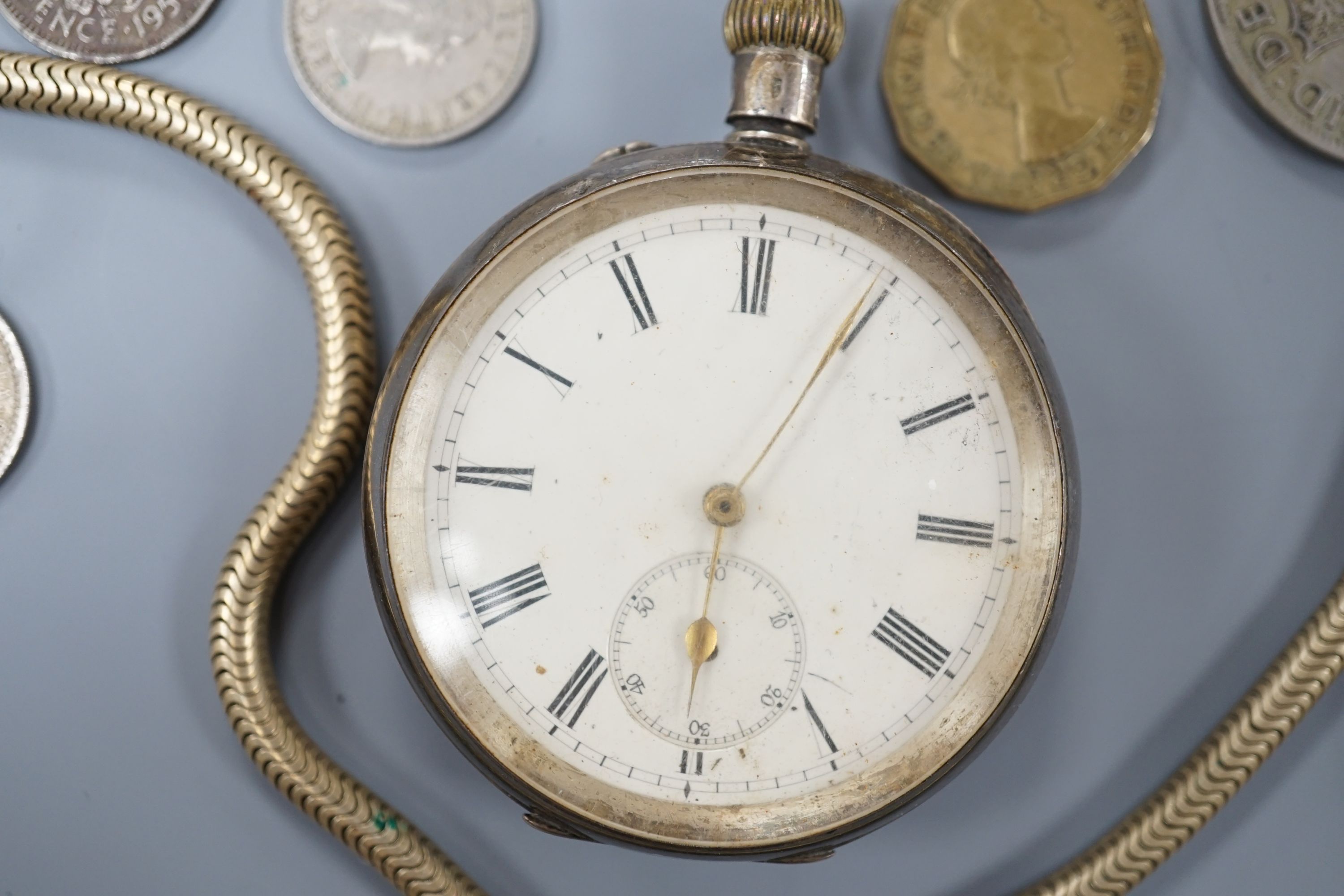 A late Victorian silver hunter keywind pocket watch, by Willcox of Grahams Town, one other white metal pocket watch, assorted minor coins and a sterling pen.